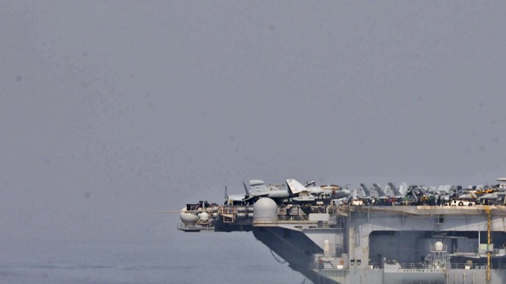 U.S. Navy ships transit the Strait of Hormuz