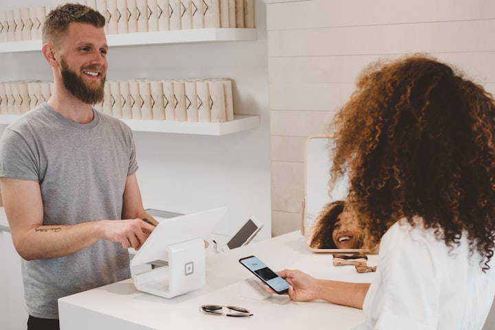 A retail checkout counter — stand-in for a P2P quote that should be screened before anyone sends freezeable USDT or USDC.