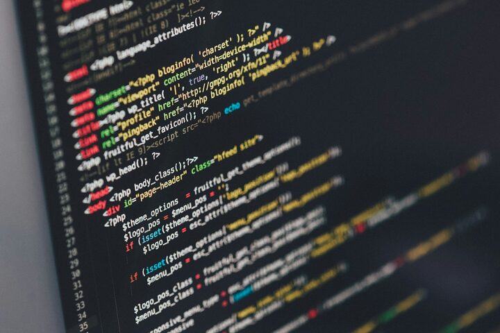 Code editor close-up — contract reads are point-in-time evidence.