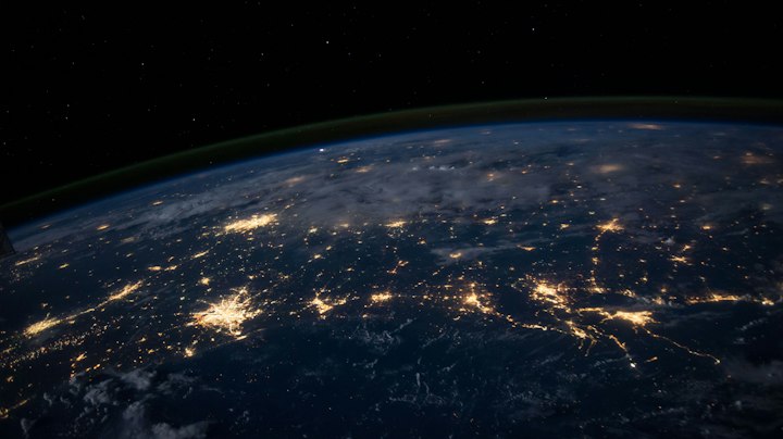 Earth at night — stand-in for multi-hop paths that are easy to over-narrate.